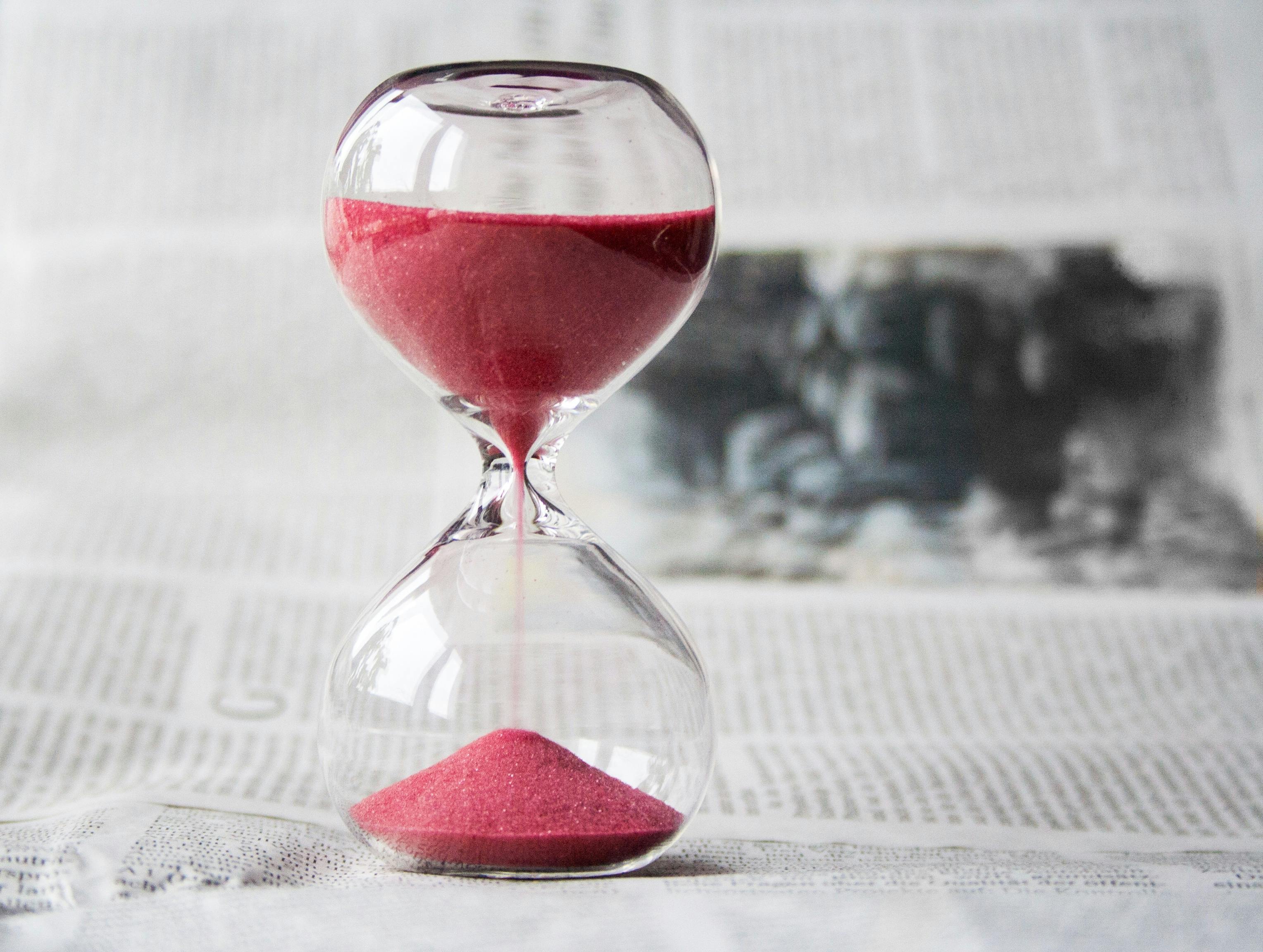 hour glass with sand falling